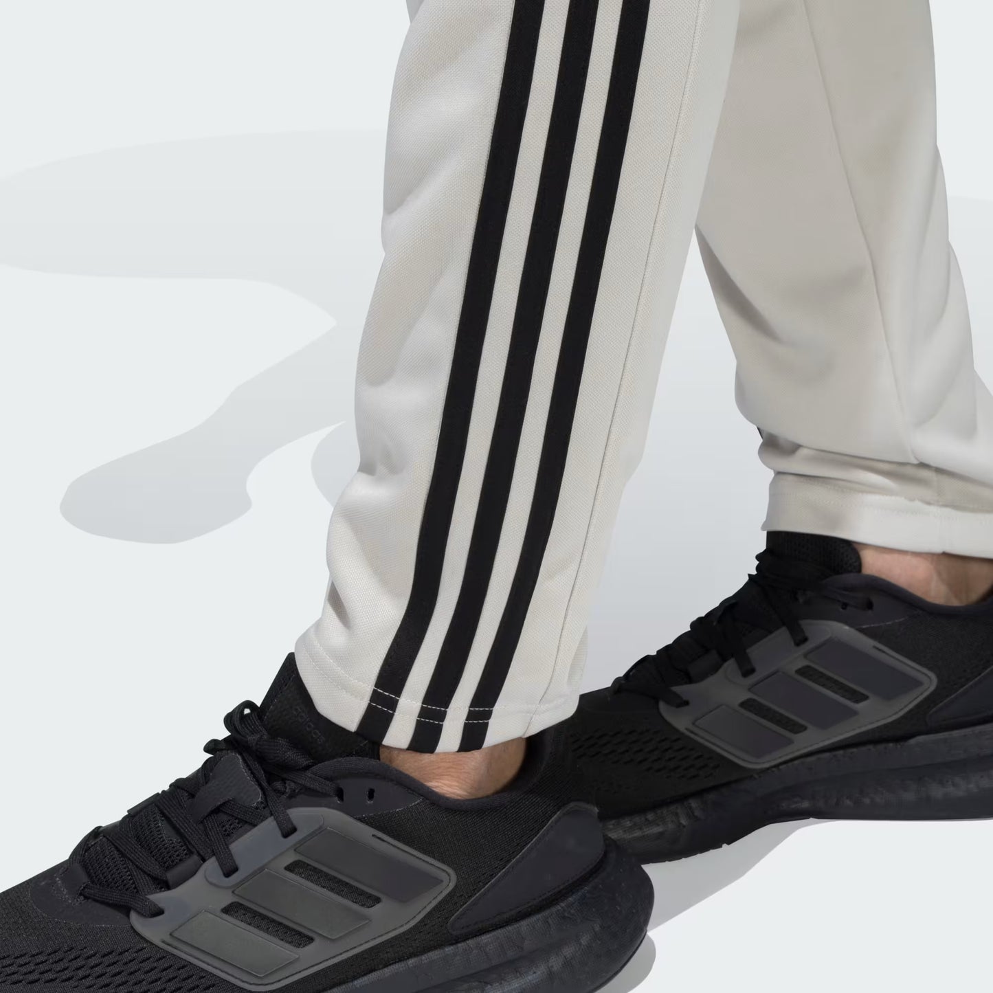 Adidas Solid & Casual Men Track Pants color Blue & Grey